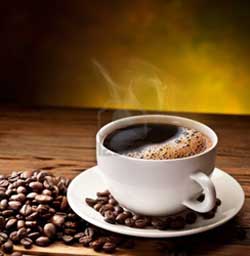 Cup of coffee with fresh coffee beans