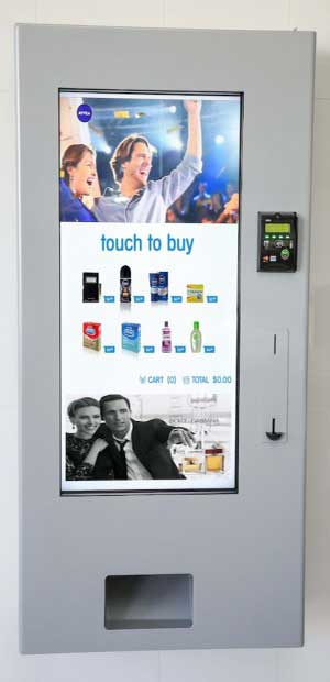 digital advertising display - toiletrie vending machine